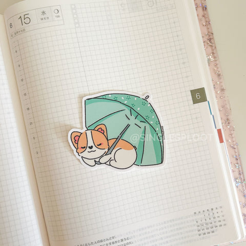 Sleeping Under the Umbrella Corgi Sticker